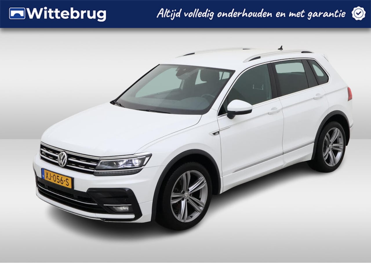 Volkswagen Tiguan - 1.5 TSI ACT R-Line / PARK. SENSOREN/ LED/ ELEK. ACHTERKLEP/ NAVI/ 19" LMV - AutoWereld.nl