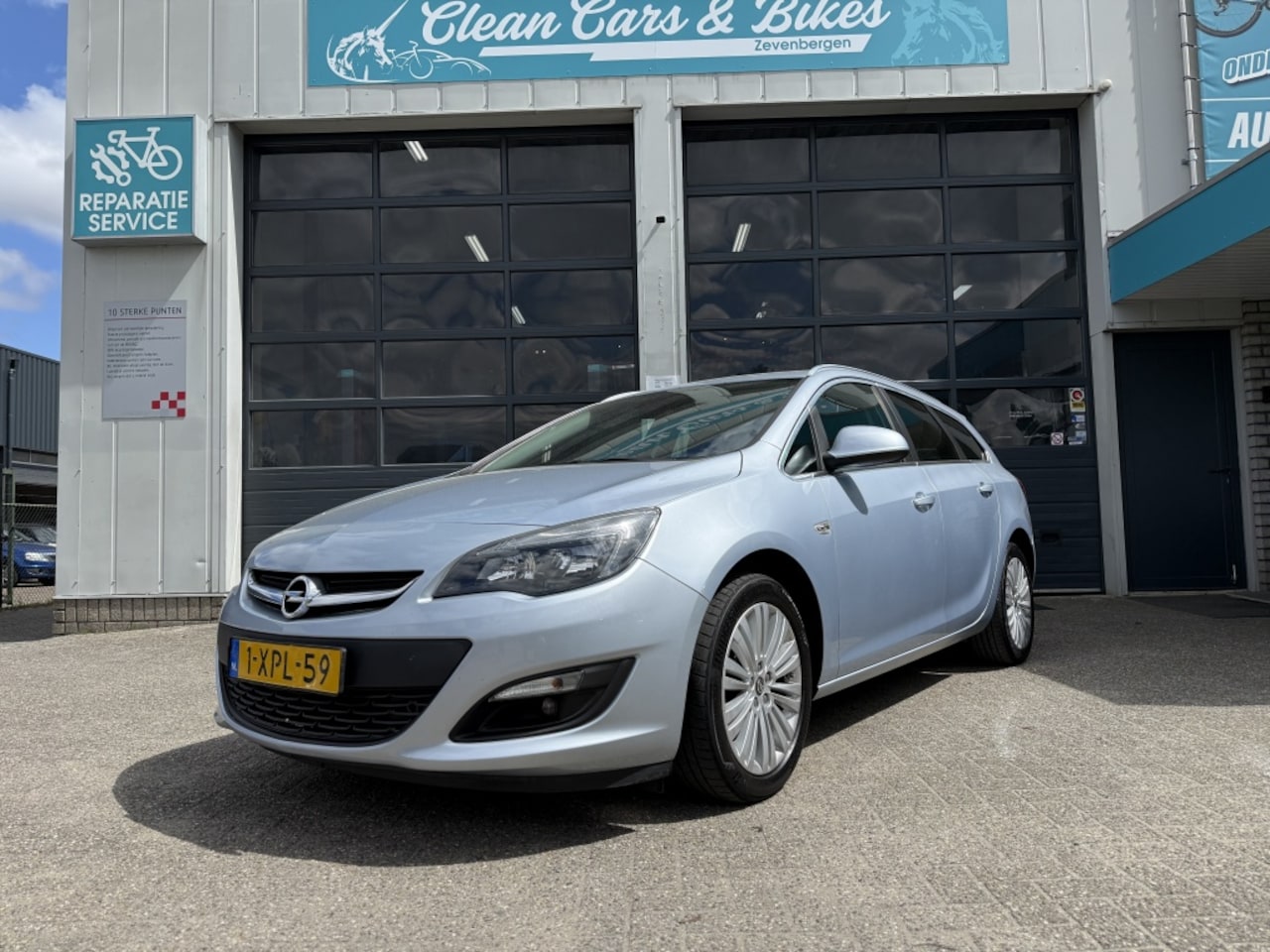 Opel Astra Sports Tourer - 1.4 Turbo Design Ed. - AutoWereld.nl