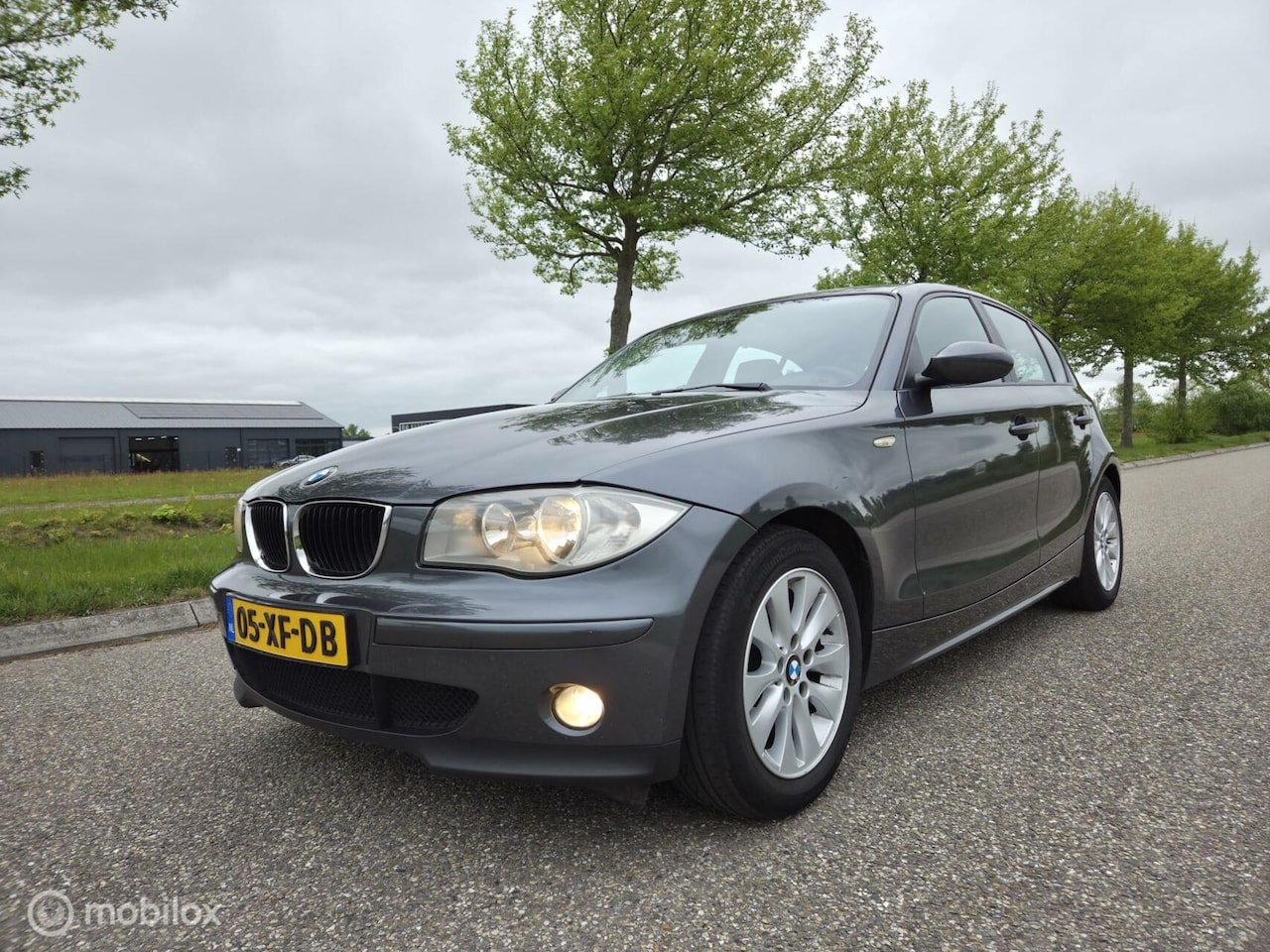 BMW 1-serie - 118i High Executive 5 Deurs CRUISE CLIMA NAP - AutoWereld.nl