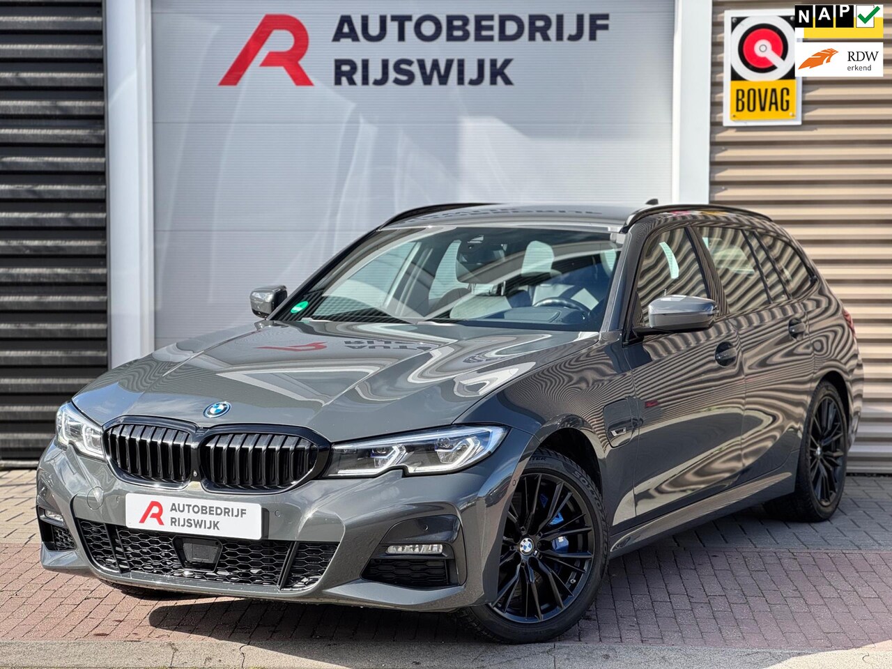 BMW 3-serie Touring - 330e M Sport Memory/Laser/360/HUD - AutoWereld.nl