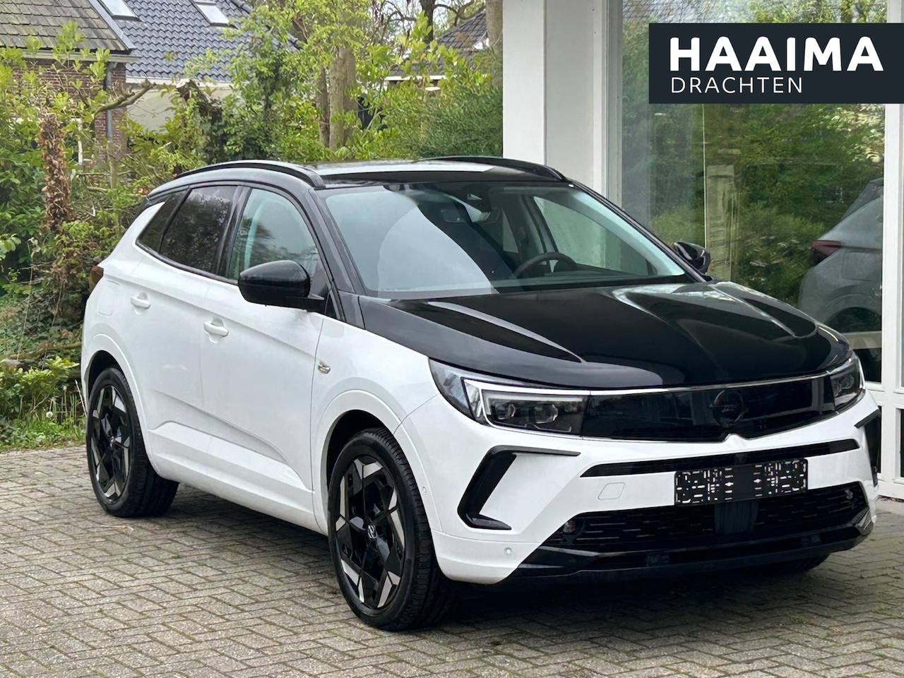 Opel Grandland - 1.6 Turbo Plug-In Hybrid GSe | Elektrische kofferklep | Parkeersensoren V+A | Achteruitrij - AutoWereld.nl