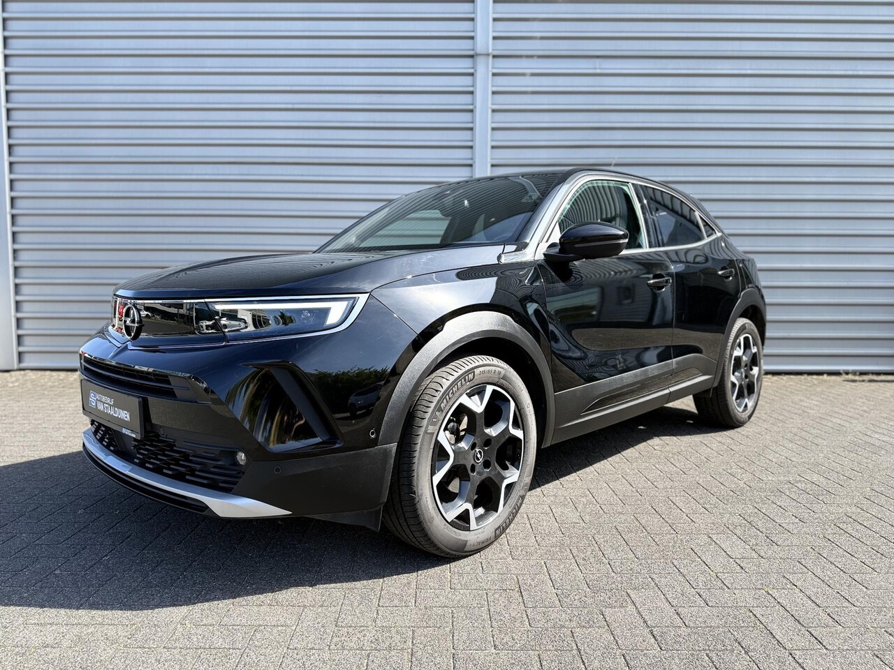 Opel Mokka - 1.2 Turbo Ultimate 130PK Automaat | Voorstoelen met massagefunctie | Achteruit rij camera - AutoWereld.nl