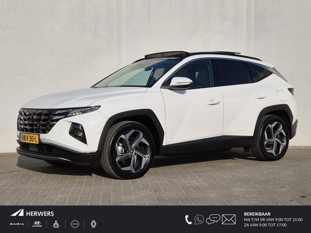 Hyundai Tucson - 1.6 T-GDI PHEV 265pk Premium Sky 4WD Automaat / Accu SoH 100% / Glazen schuif- en kantelda - AutoWereld.nl