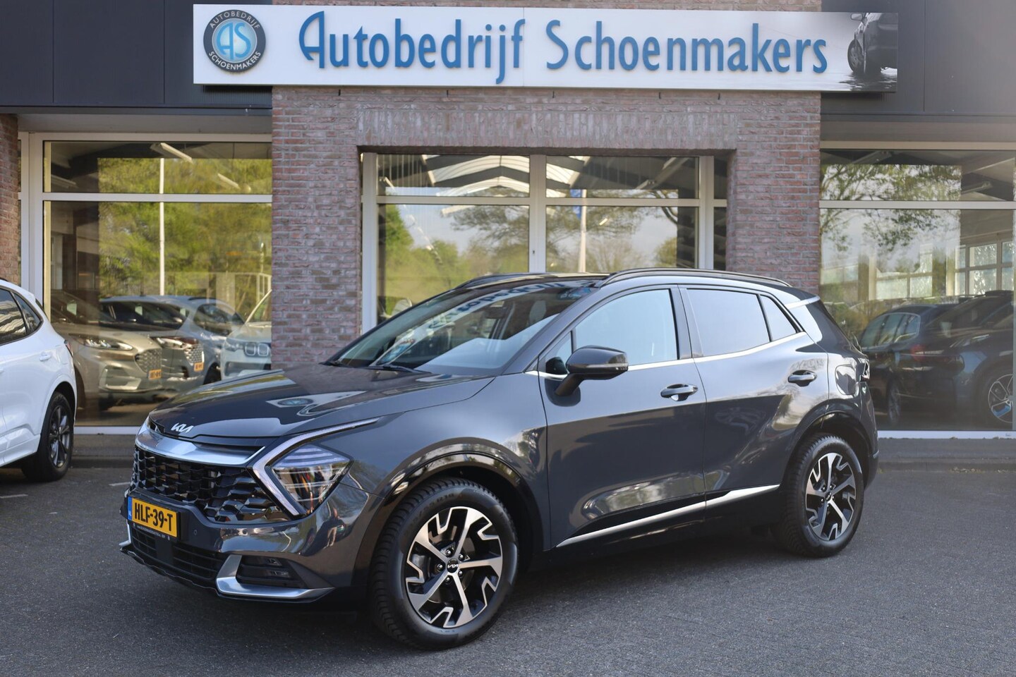 Kia Sportage - 1.6 T-GDi MHEV DynamicPlusLine PANO CAMERA HALFLEER CARPLAY DAB ACC STUUR+4xSTOELVERWARMIN - AutoWereld.nl