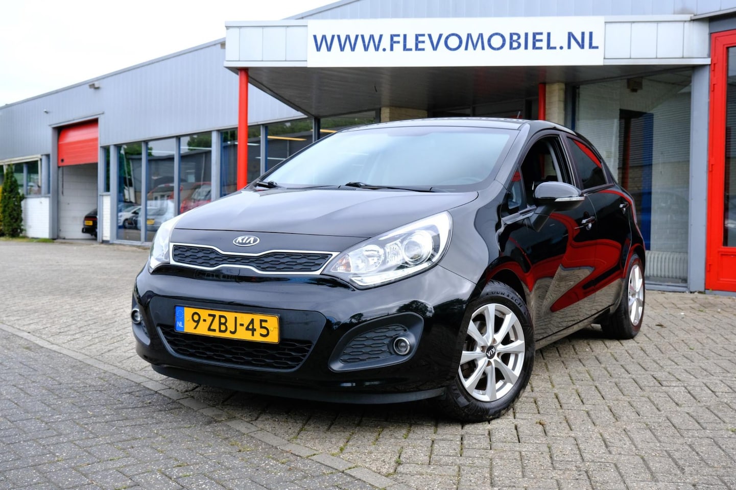 Kia Rio - 1.2 CVVT World Cup Edition Plus 5-drs Leder|Airco|Cruise - AutoWereld.nl