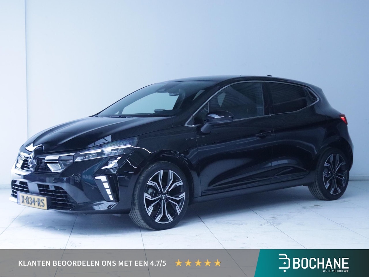 Mitsubishi Colt - 1.6 HEV First Edition Clima/Navi/Stoelverwarming - AutoWereld.nl