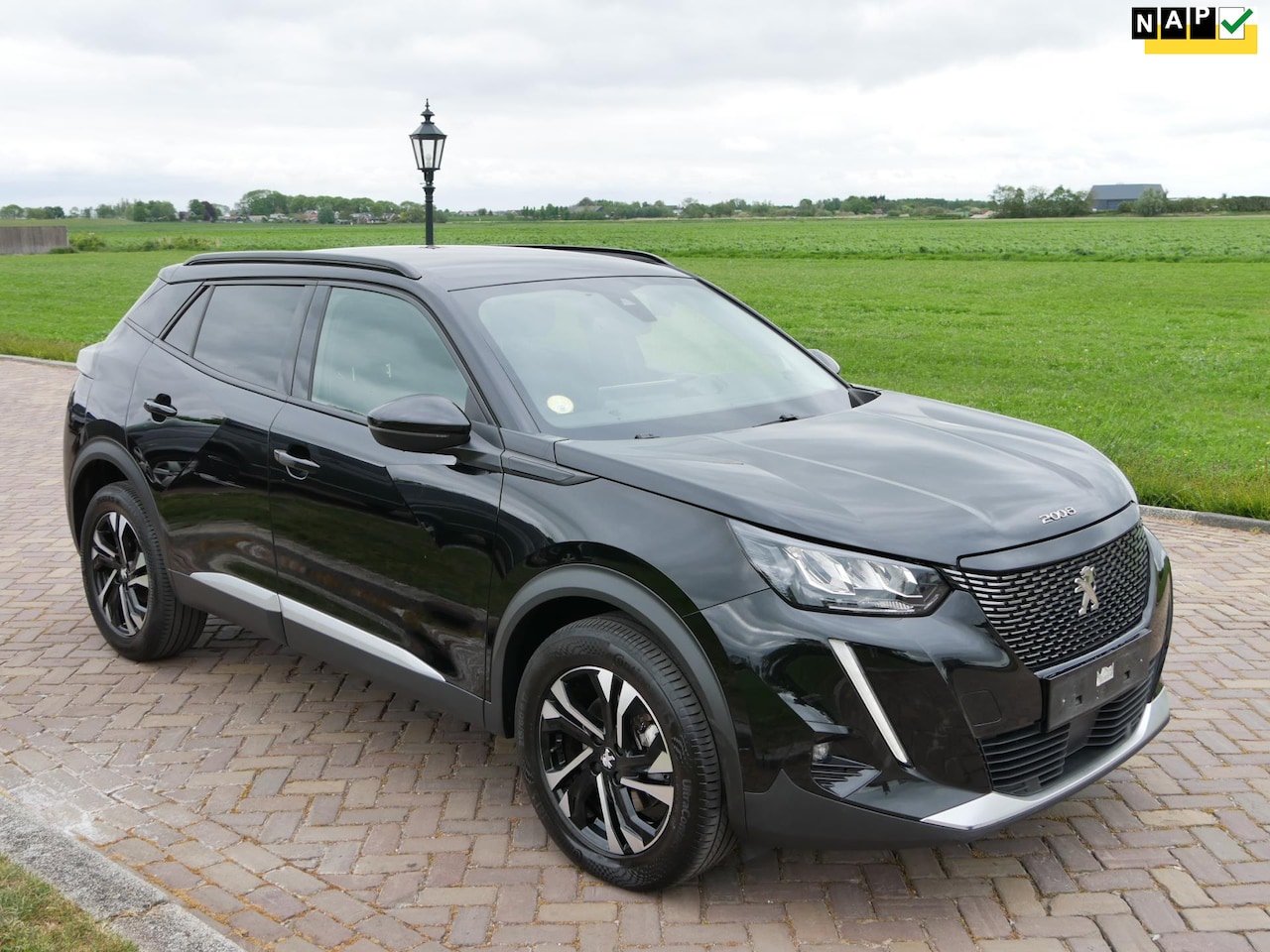 Peugeot 2008 - 1.5 BlueHDi Allure Pack AUT CLIMA NAVI ** 11599 NETTO ** - AutoWereld.nl