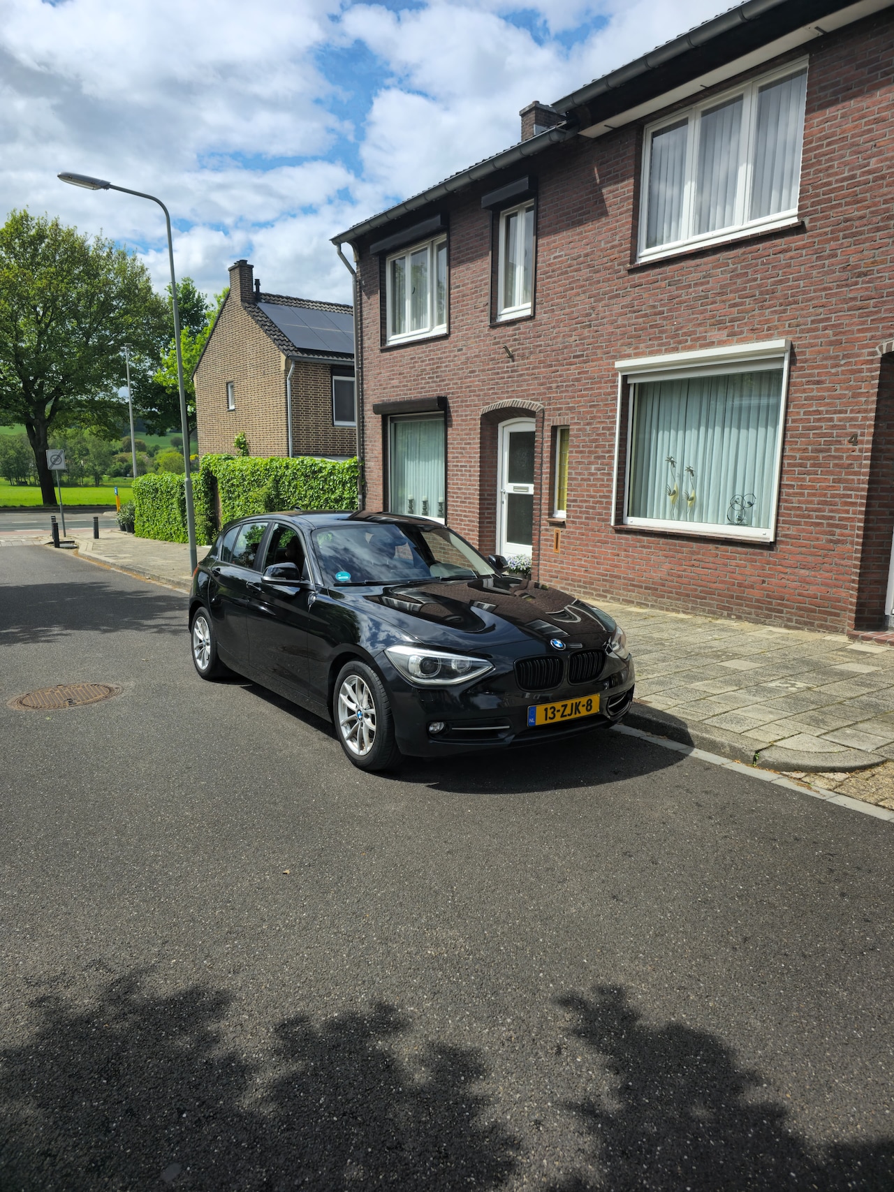 BMW 1-serie - 114i EDE Upgrade Edition Sportstoelen, stoelverwarming, breed navi, android auto - AutoWereld.nl