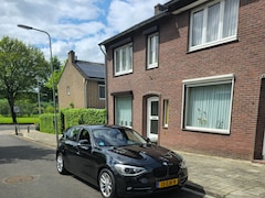 BMW 1-serie - 114i EDE Upgrade Edition Sportstoelen, stoelverwarming, breed navi, android auto