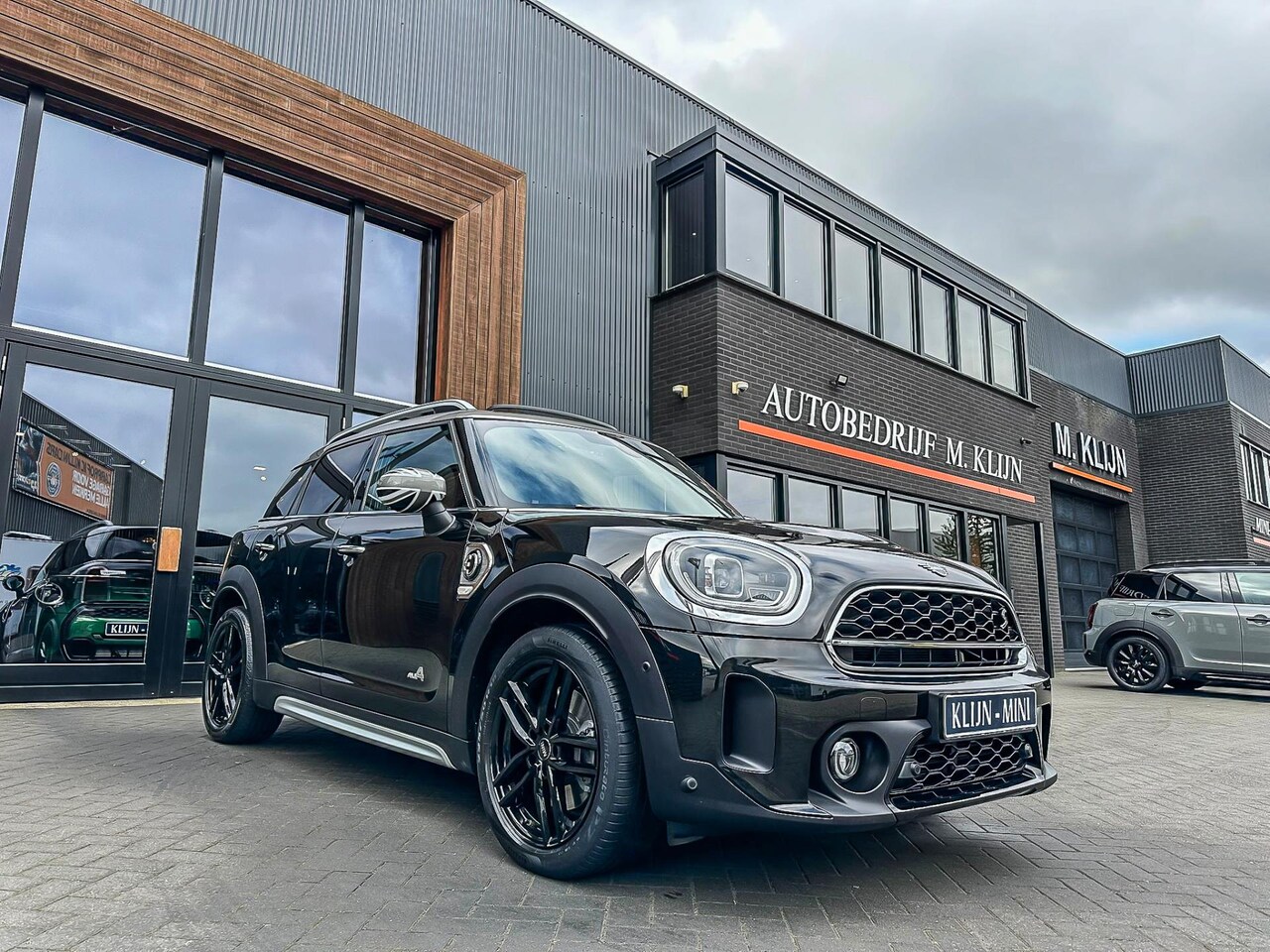 MINI Countryman - Mini 2.0 Cooper S E ALL4 Chili 220pk Facelift/Lounge Leer/Pano/Led/Camera/18"S - AutoWereld.nl
