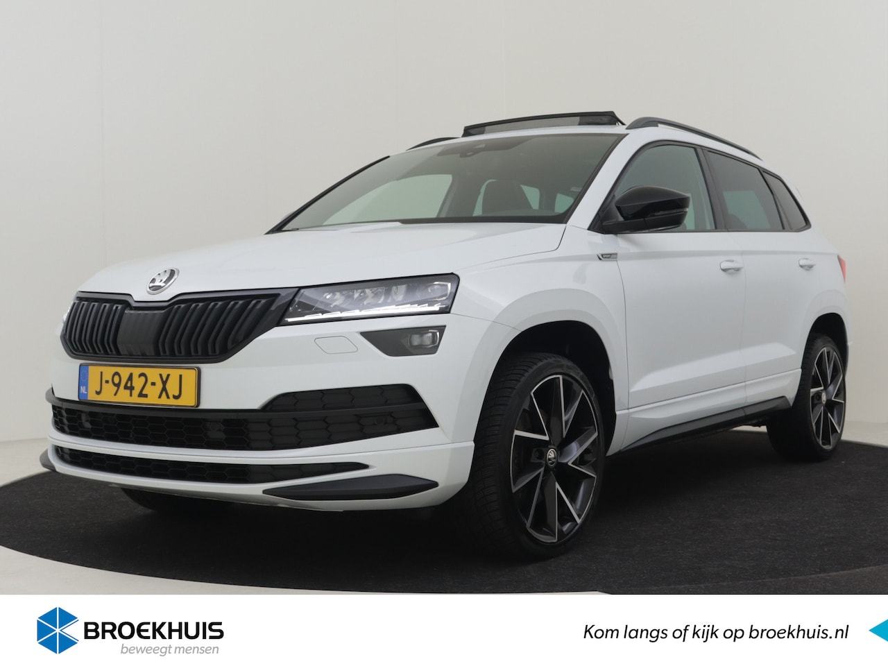 Skoda Karoq - 1.5 TSI ACT 150pk Sportline Business | 100% Dealeronderhouden | 1ste eigenaar | Panorama-d - AutoWereld.nl