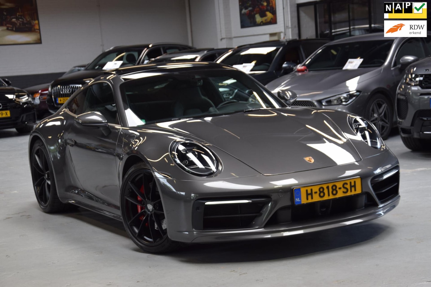 Porsche 911 - 992 3.0 Carrera 4 S *Sport Design Pakket*99| Navi|Leder|Chrono|Approved|33000km!! - AutoWereld.nl