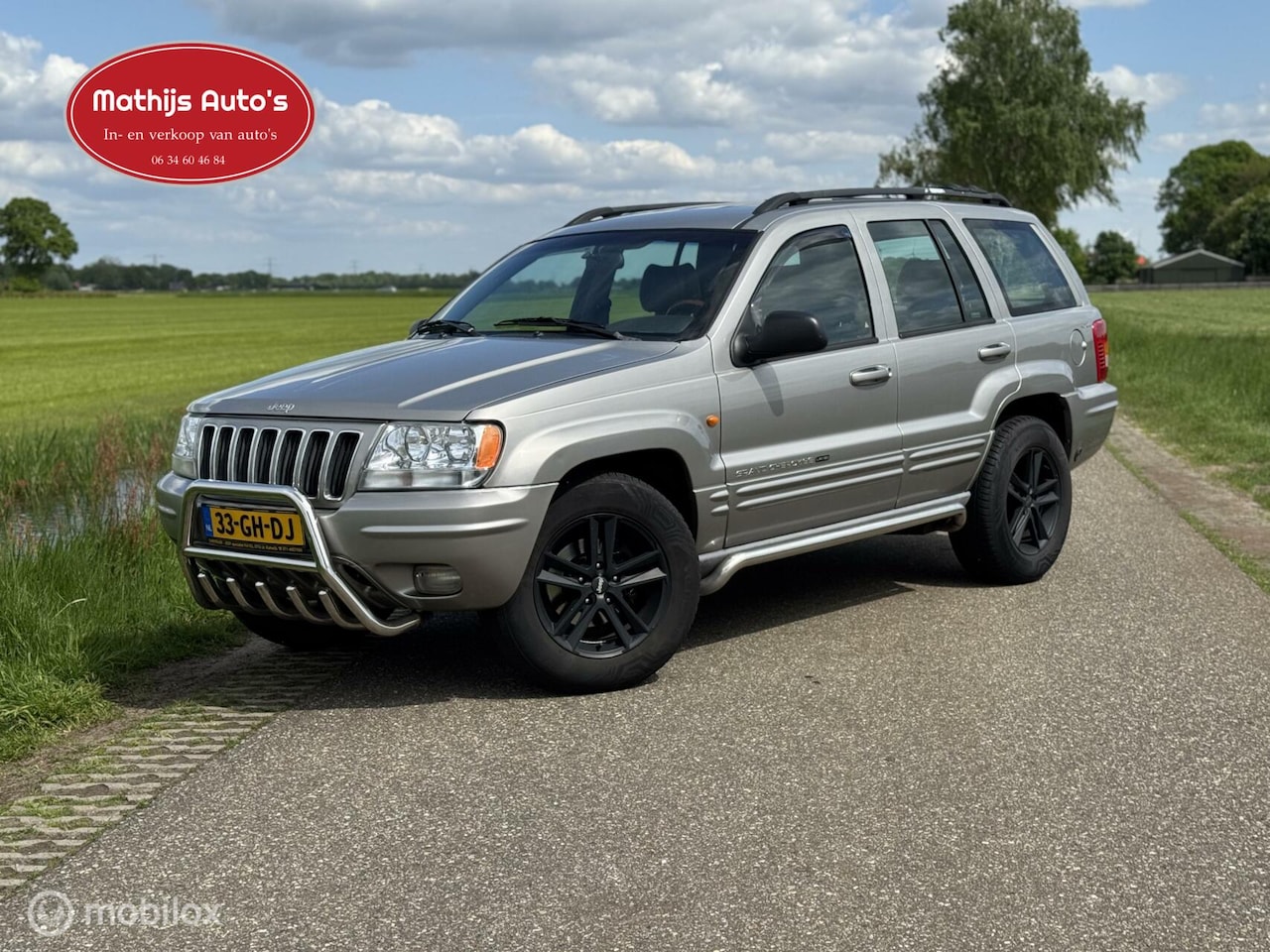 Jeep Grand Cherokee - 4.0i Limited LPG G3 Automaat Youngtimer! - AutoWereld.nl