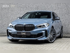 BMW 1-serie - M135i xDrive | LiveCockpit | Schaalstoelen | Memory | ACC | Head-Up | 19"LM | Storm Bay