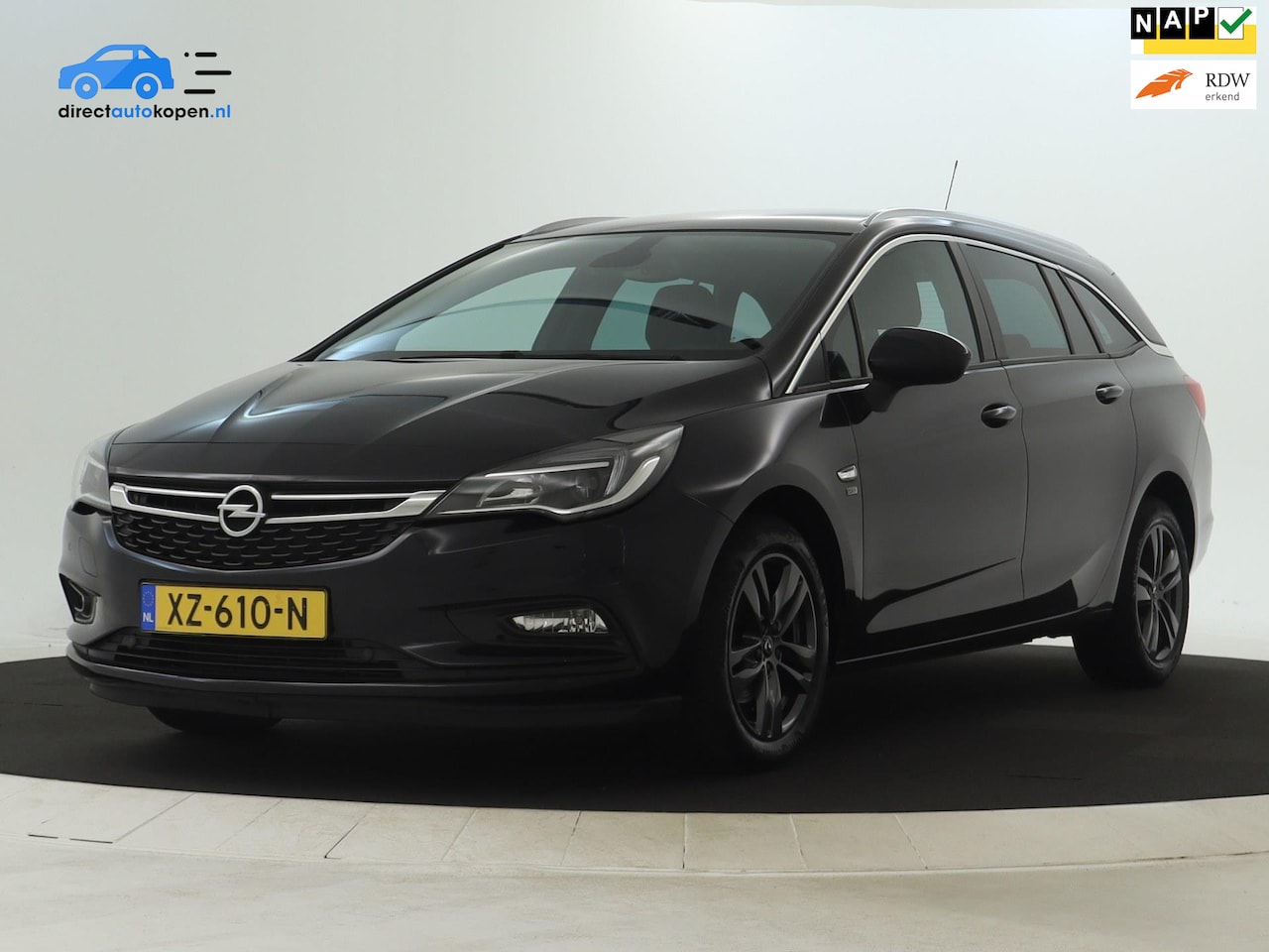 Opel Astra Sports Tourer - 1.0 Turbo 120 Jaar Edition NAVI | CarPlay | Stoel- & stuurverwarming - AutoWereld.nl
