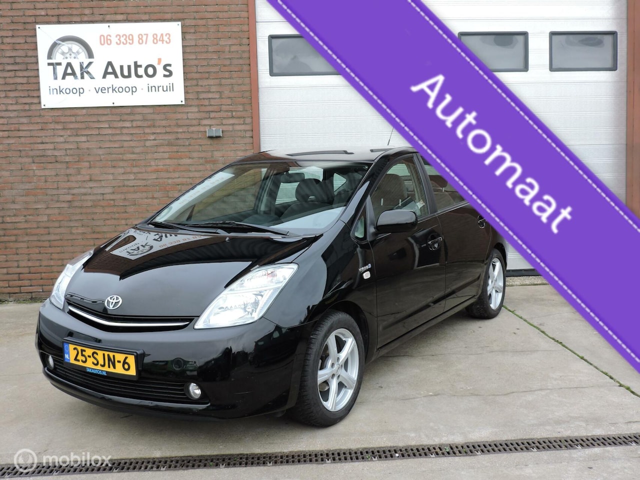 Toyota Prius - 1.5 VVT-i/Zwart/navi/Camera/met boejes en NAP - AutoWereld.nl