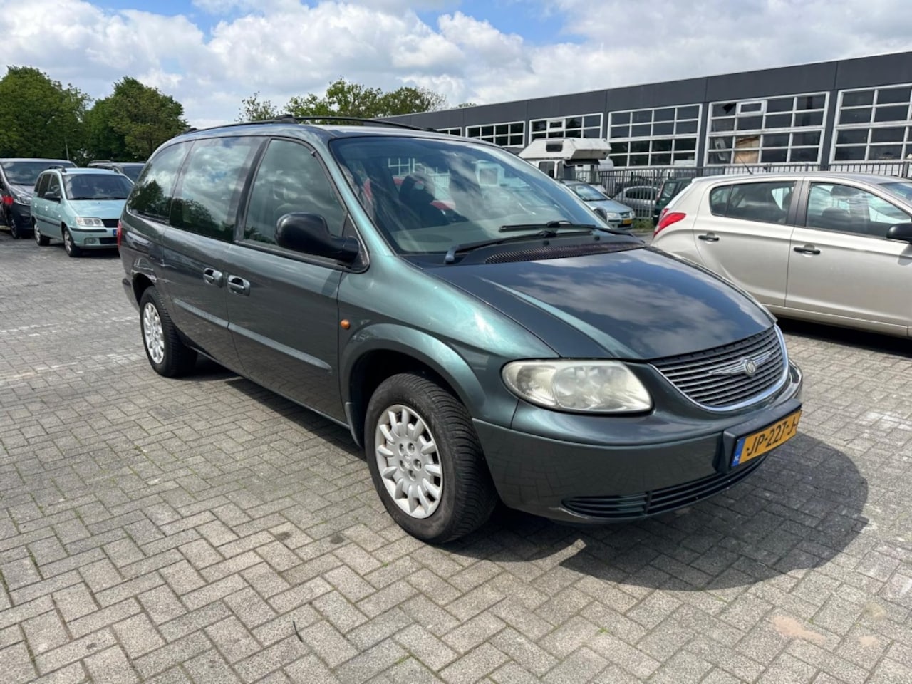 Chrysler Grand Voyager - 3.3i V6 SE Luxe 3.3i V6 SE Luxe - AutoWereld.nl
