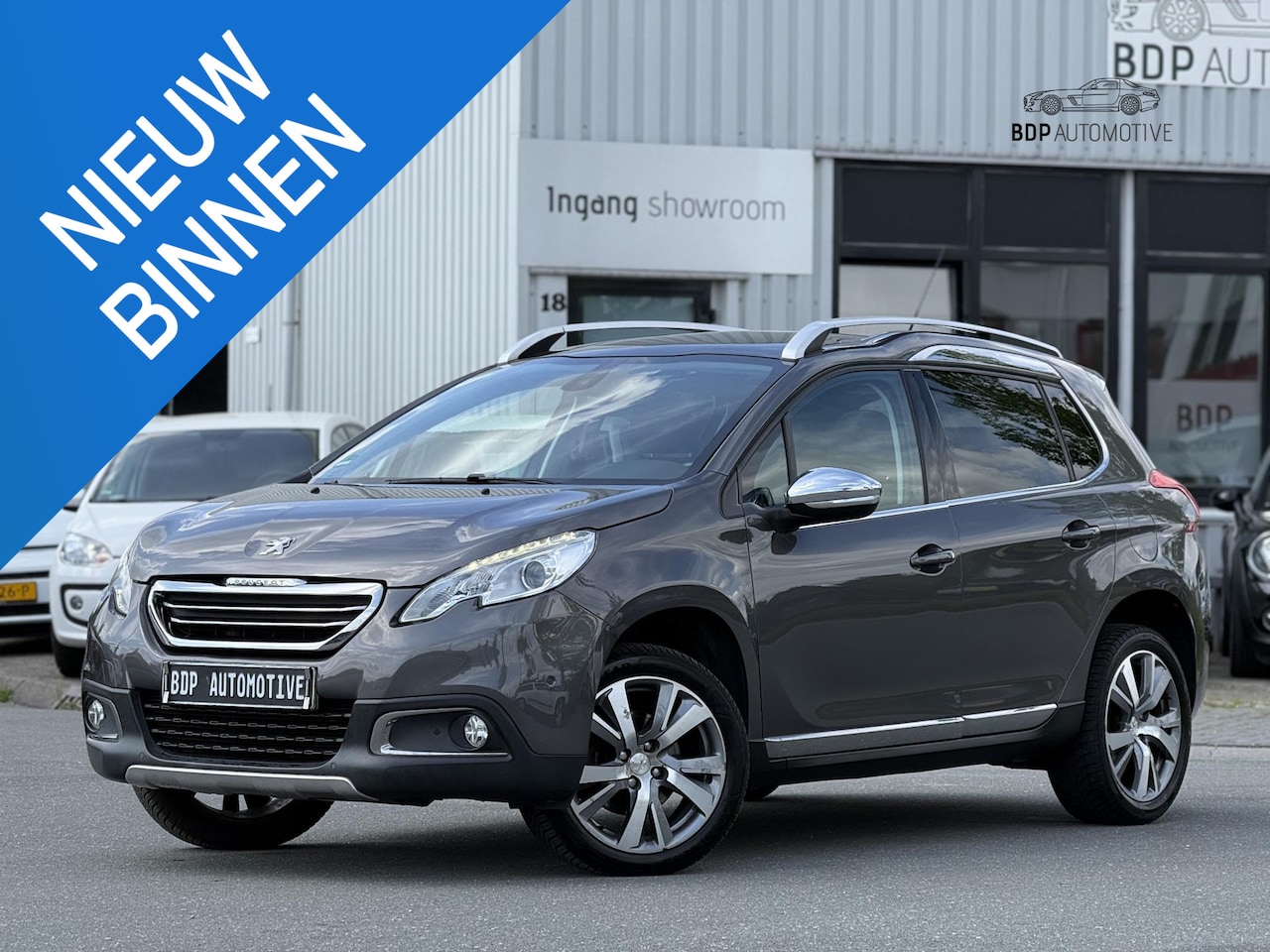 Peugeot 2008 - 1.2 PureTech Allure PANORAMADAK/NAVI/HALF LEER - AutoWereld.nl
