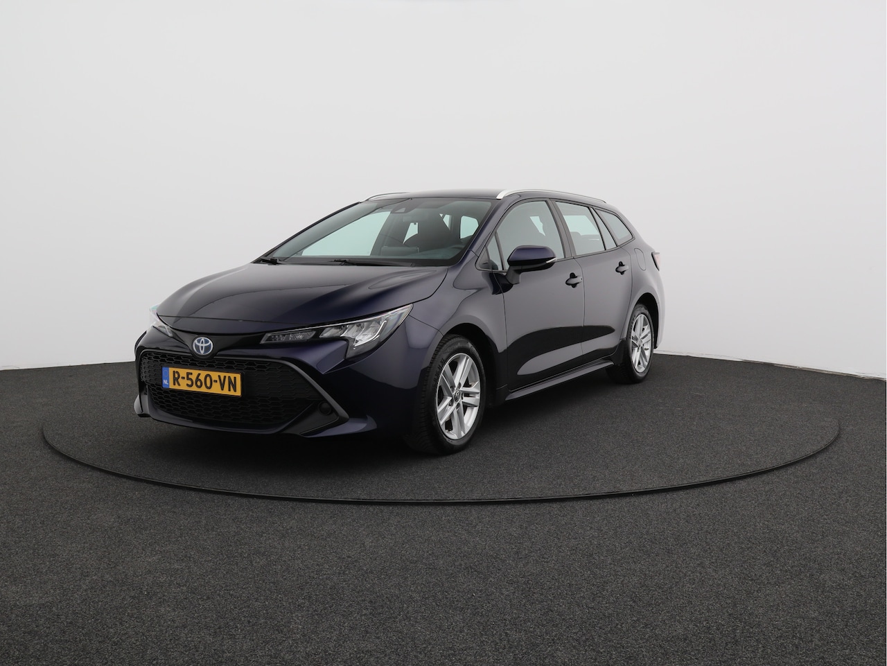 Toyota Corolla Touring Sports - 1.8 Hybrid Active/ lage km/ zeer mooi! - AutoWereld.nl
