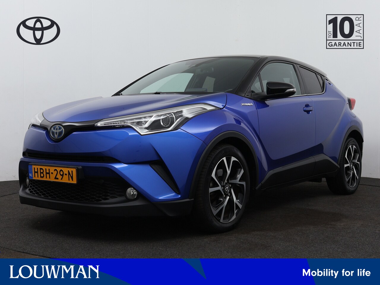 Toyota C-HR - 1.8 Hybrid Bi-Tone Limited | Camera | Climate Control | Cruise Control Adaptief | LM velge - AutoWereld.nl