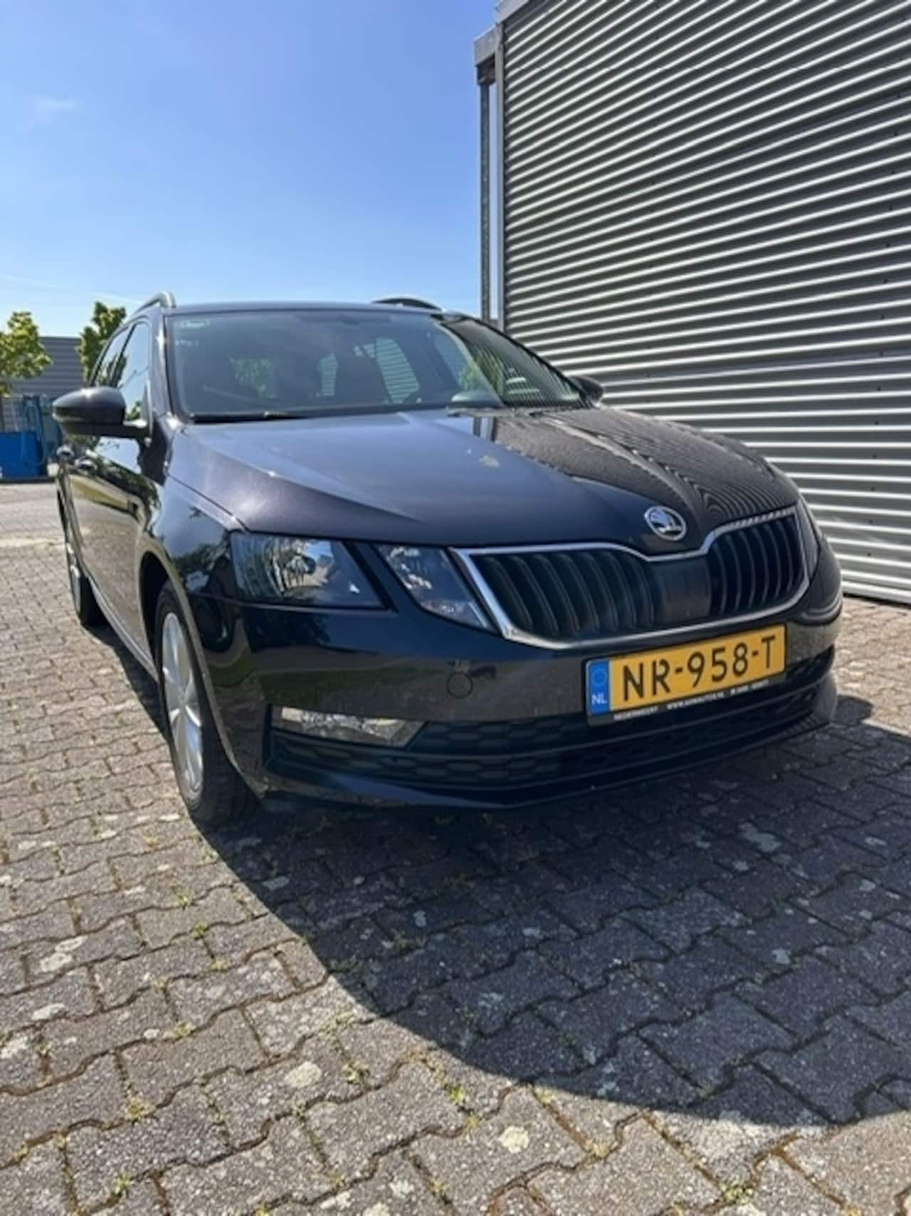 Skoda Octavia Combi - 1.6 TDI Grt Amb Bns - AutoWereld.nl