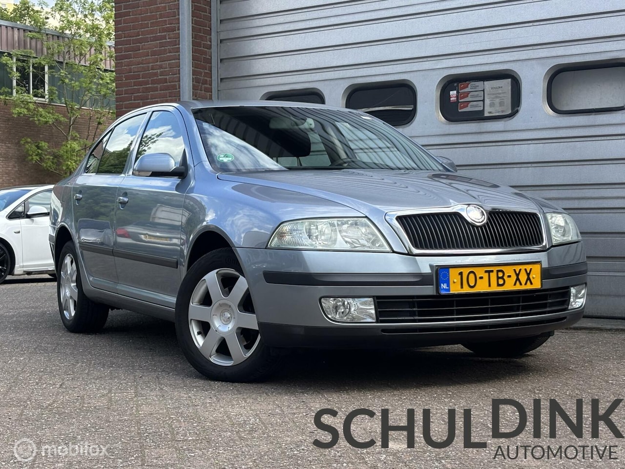 Skoda Octavia - 1.6 FSI Elegance TREKHAAK|PARKEERSENSOREN - AutoWereld.nl