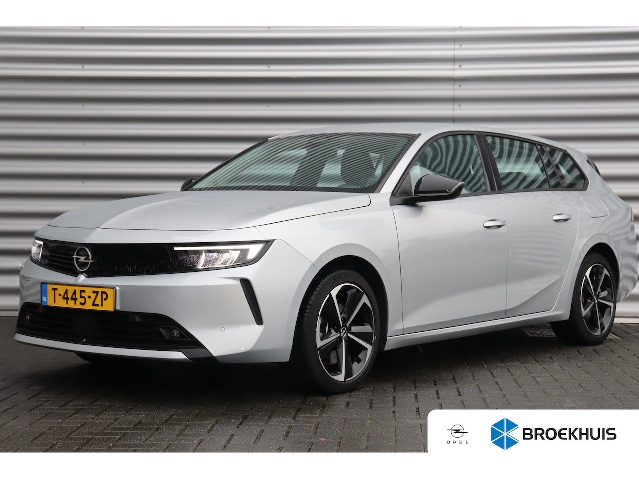 Opel Astra Sports Tourer - 1.6 TURBO 180PK HYBRID AUTOMAAT | Achterbank in delen neerklapbaar | Airco | Airco (automa - AutoWereld.nl