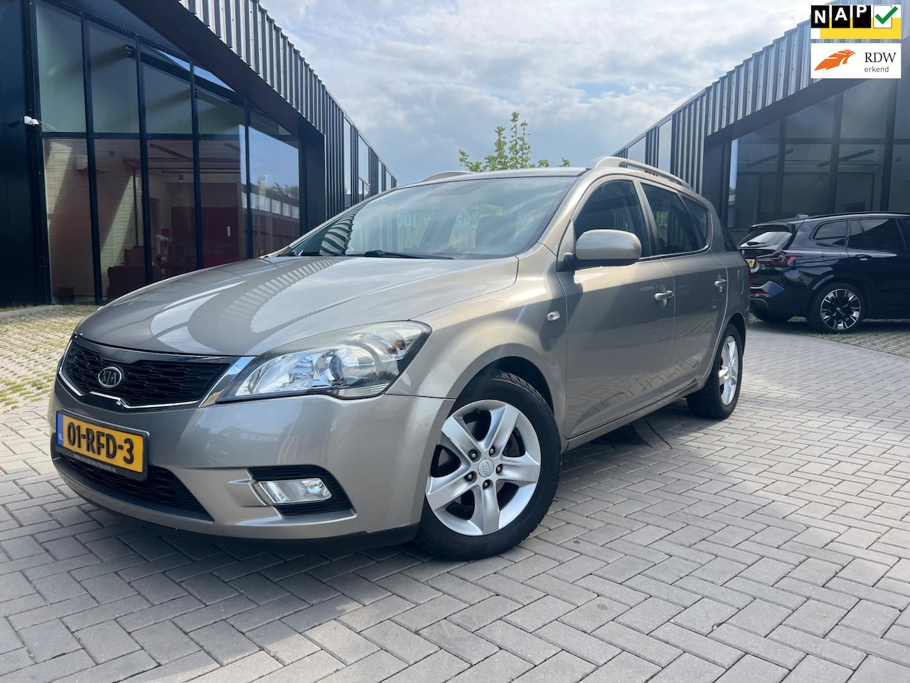 Kia Cee'd Sporty Wagon - 1.4 CVVT Seven Airco Cruise Elek pakket NL Auto NAP - AutoWereld.nl