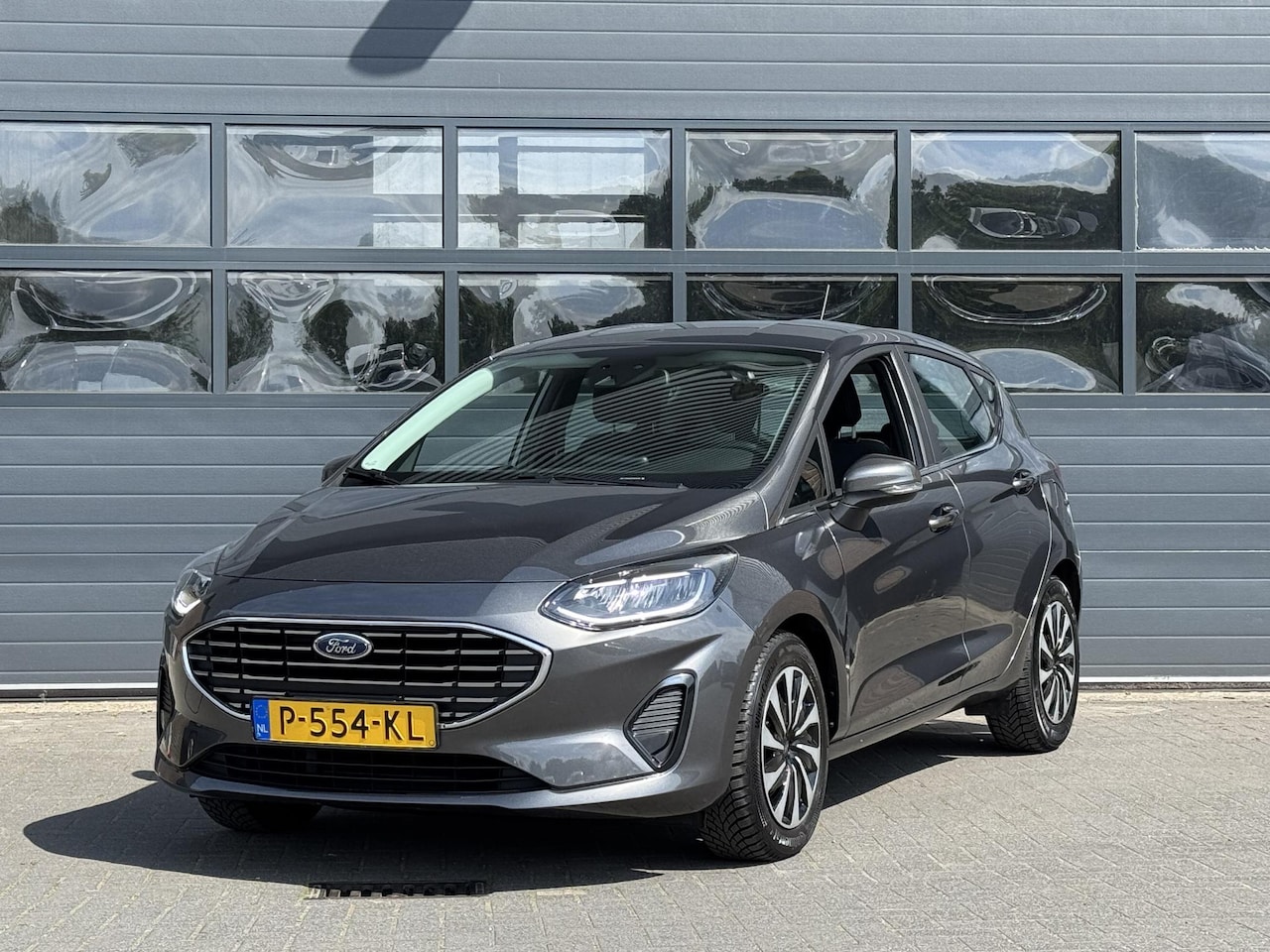 Ford Fiesta - 1.0 ECOBOOST HYBRID TITANIUM I CARPLAY I CRUISE CONTROL I CLIMATE CONTROL I NAVIGATIE - AutoWereld.nl