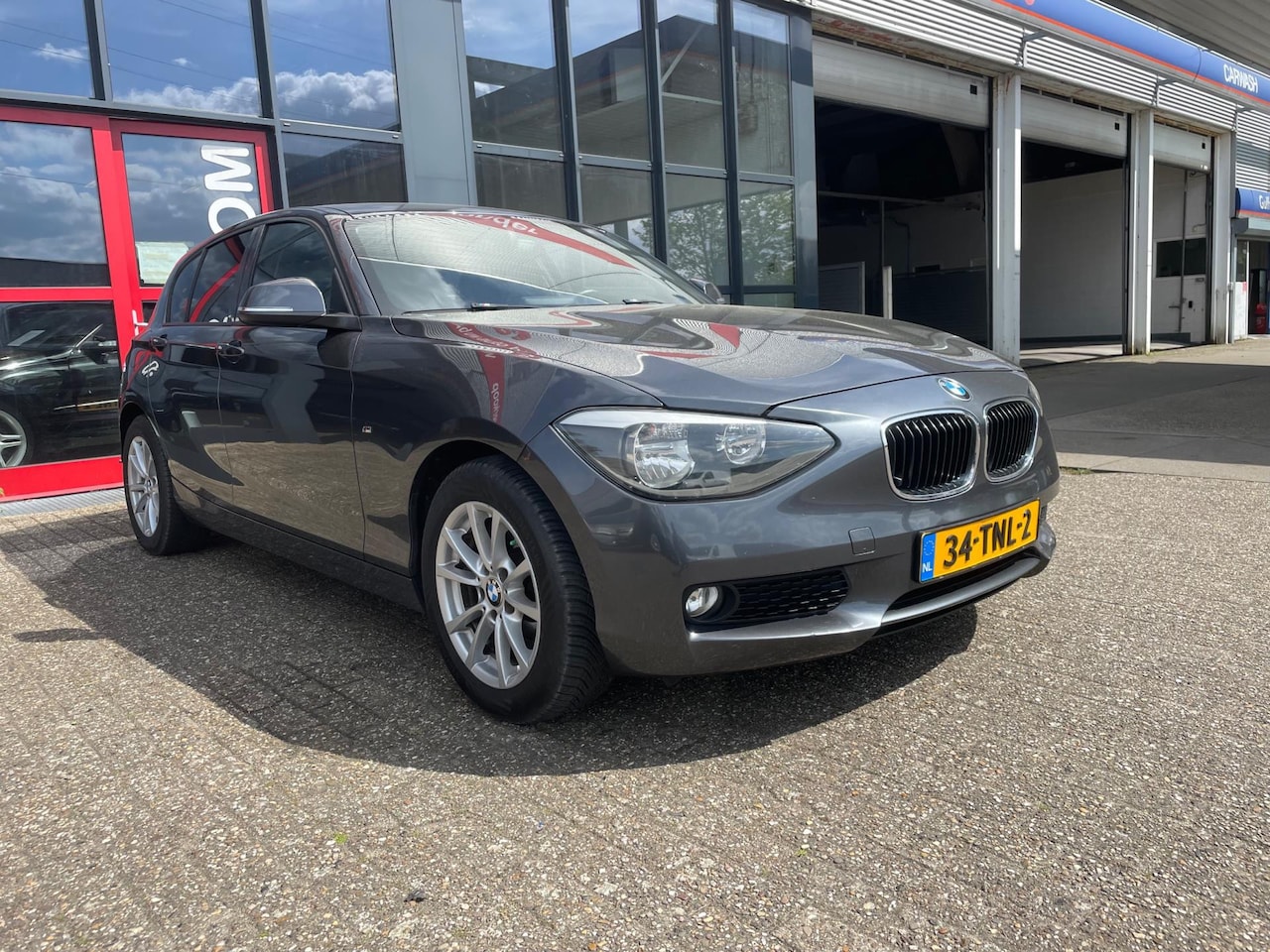 BMW 1-serie - 116i Business automaat navi in top staat - AutoWereld.nl