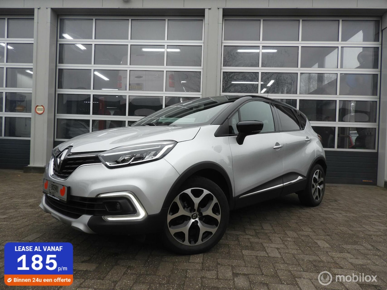 Renault Captur - 0.9 TCe Intens camera - AutoWereld.nl