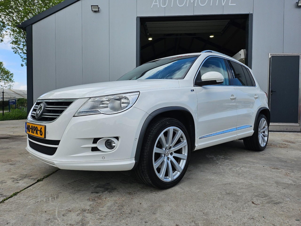 Volkswagen Tiguan - 1.4 TSI Sport&Style R LINE 110KW - AutoWereld.nl