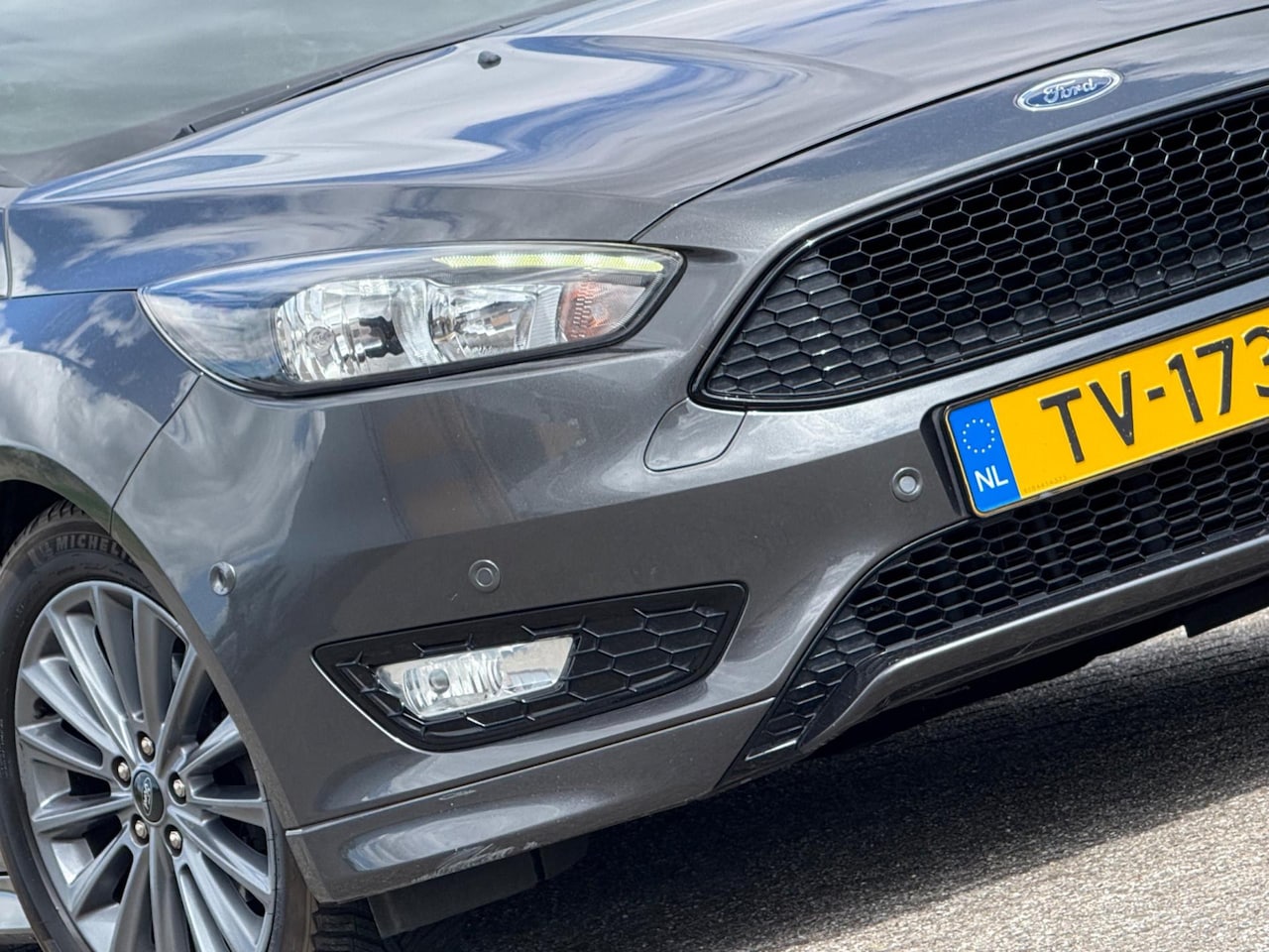 Ford Focus Wagon - 1.0 ST-Line 140pk - Magnetic - N.a.v./Cruise/Clima - AutoWereld.nl