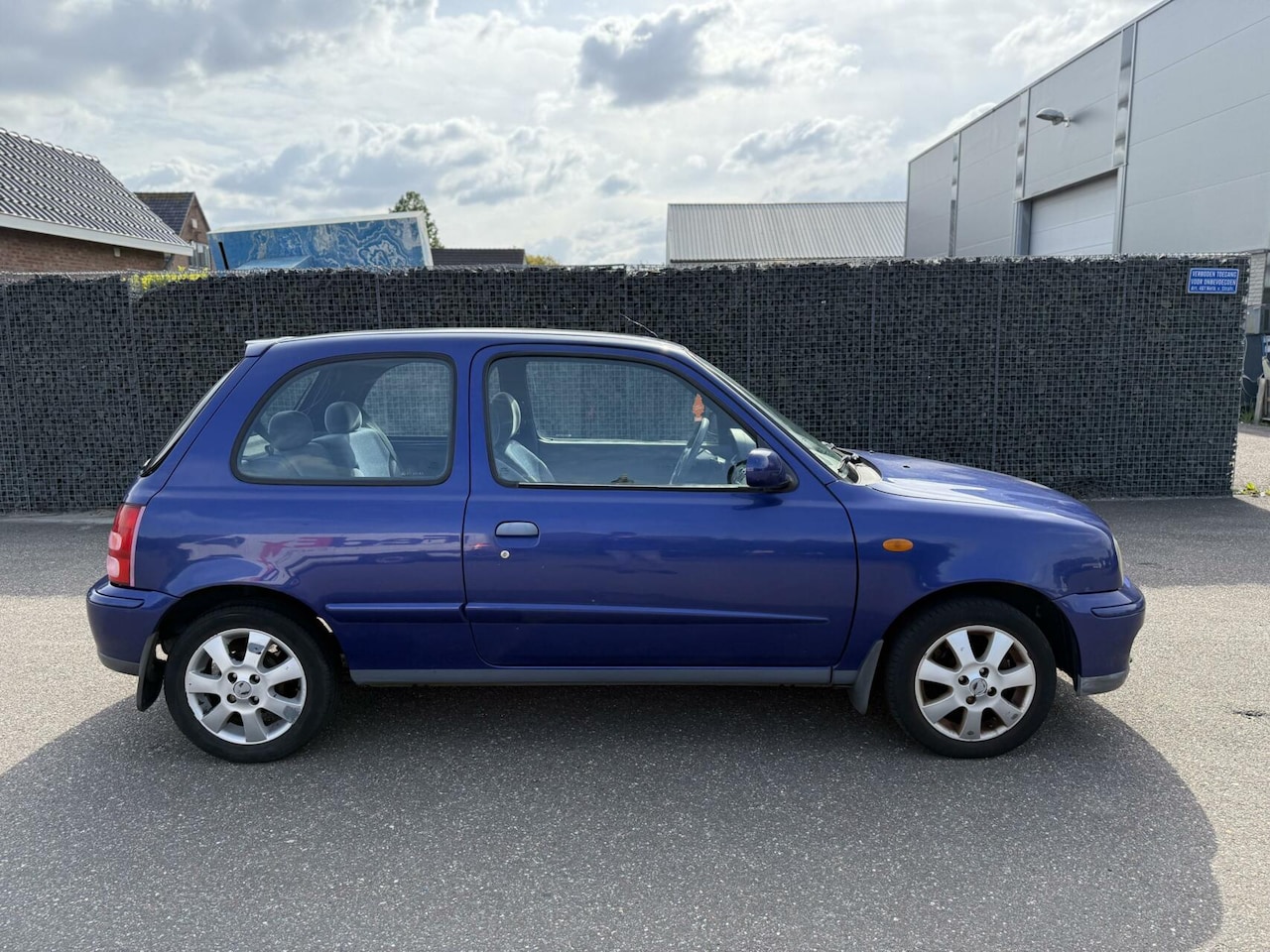 Nissan Micra - 1.4 Luxury Parkeersensoren Airco 13 maanden APK - AutoWereld.nl