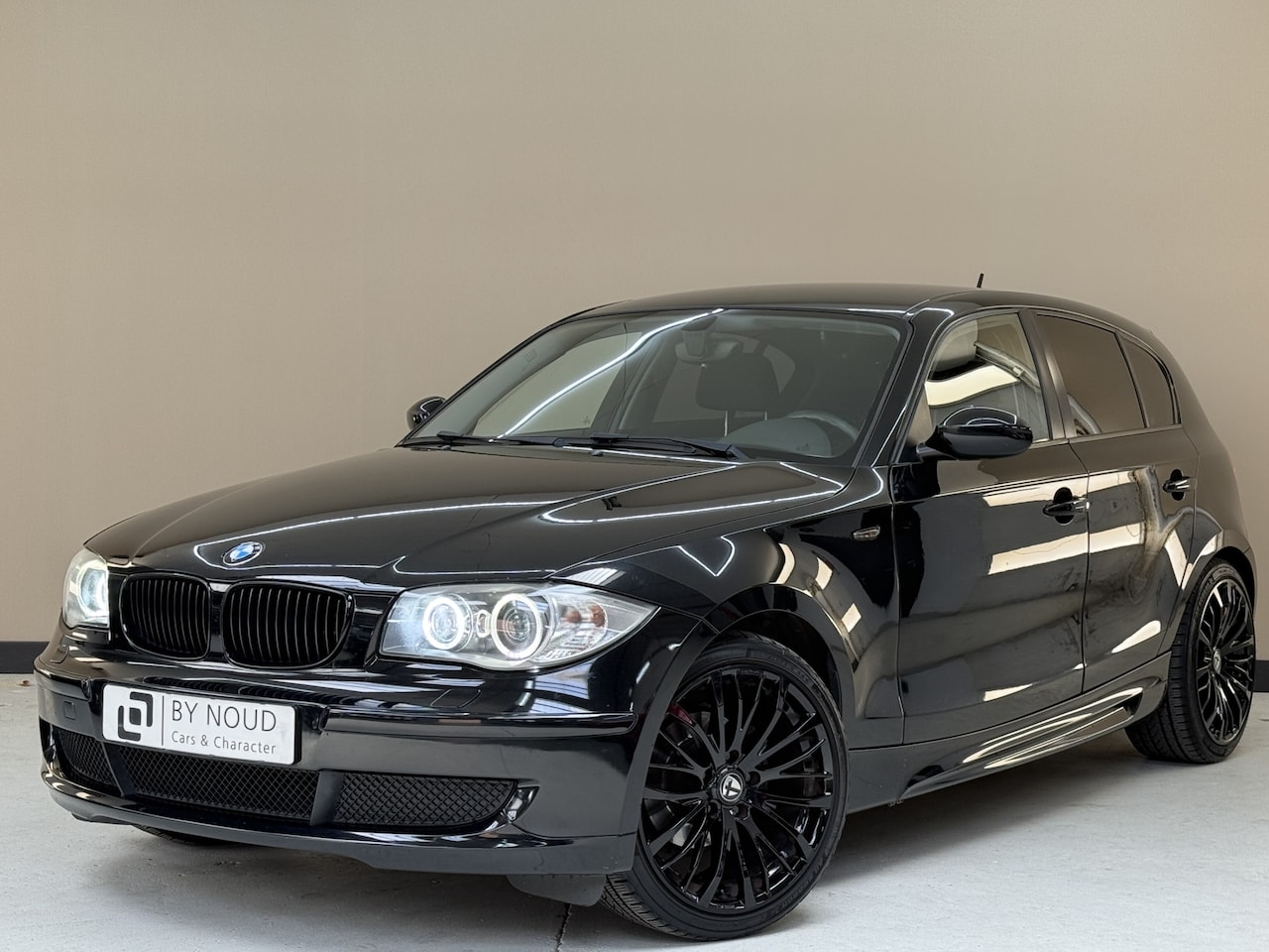 BMW 1-serie - 116i 116i, 123Pk, 2010, 18" Lichtmetalen velgen, Airco, Stoelverwarming, Elektrische ramen, Xen - AutoWereld.nl