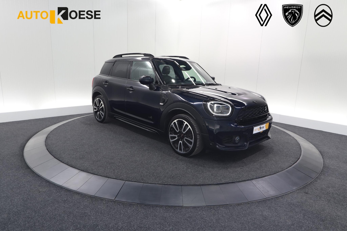 MINI Countryman - Mini 2.0 Cooper S E ALL4 Chili | Panoramadak | Camera | Apple Carplay | Elektrische Koffer - AutoWereld.nl