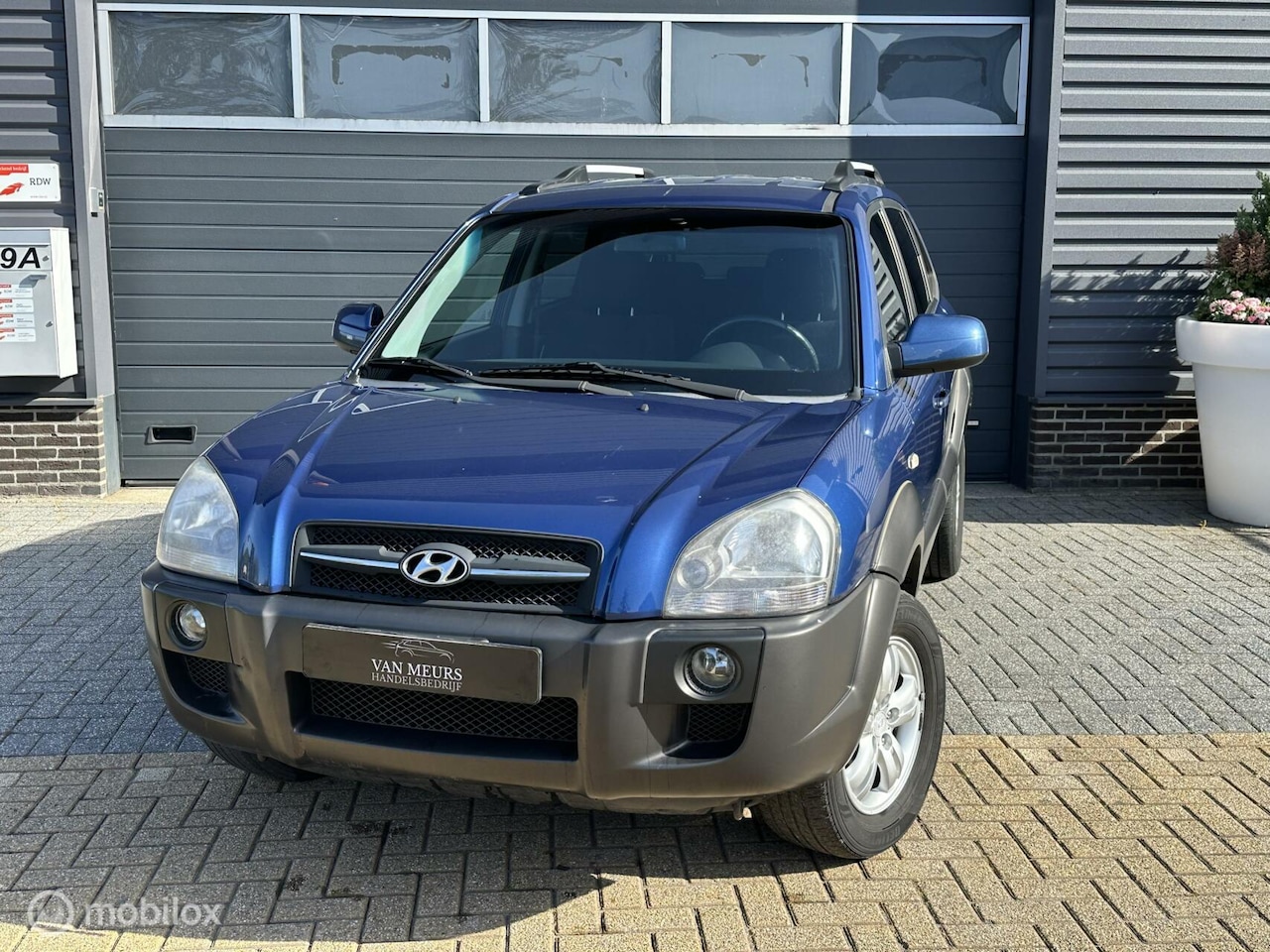 Hyundai Tucson - 2.0i Dynamic Sense 2.0i Dynamic Sense, airco, trekhaak, lm velgen, apk 09-2025 - AutoWereld.nl