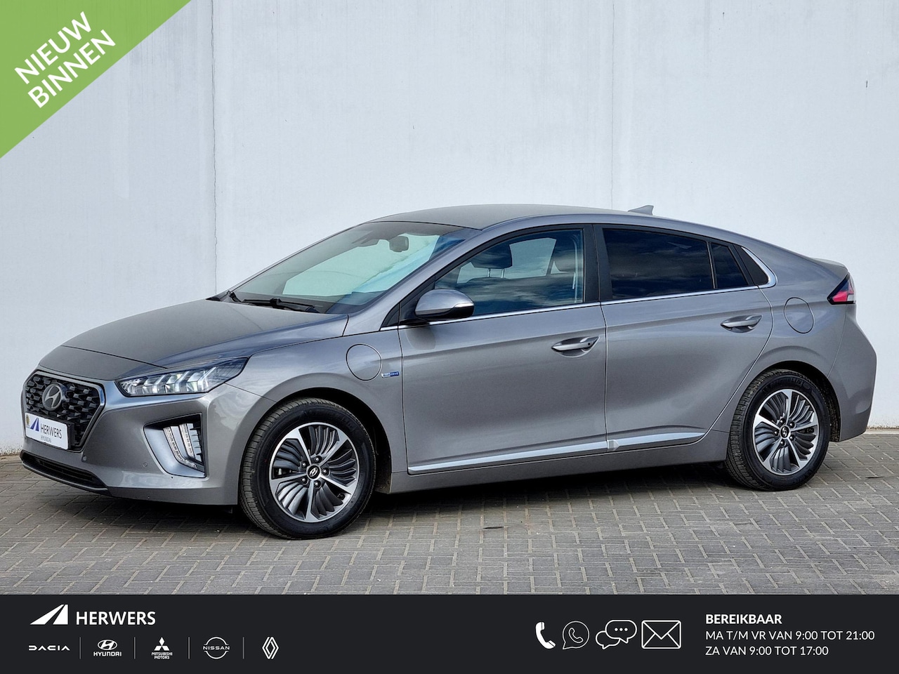 Hyundai IONIQ - 1.6 GDi PHEV Premium / Lederen Bekleding / Cruise Control Adaptief / Navigatie / Dodehoekd - AutoWereld.nl