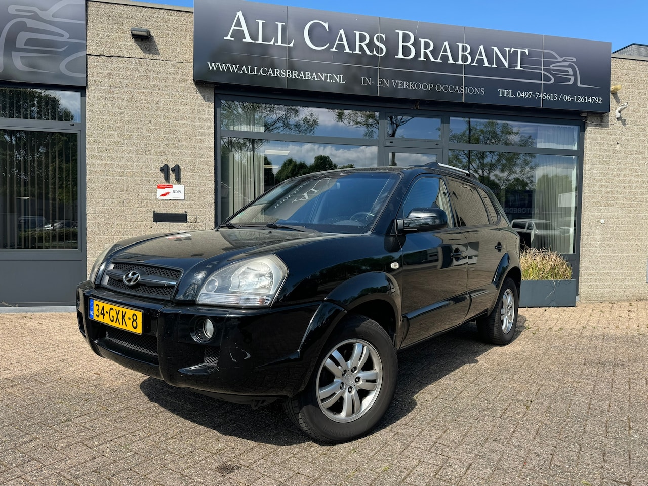 Hyundai Tucson - 2.0i Style Supreme / clima control/ leder/ nieuwe apk - AutoWereld.nl