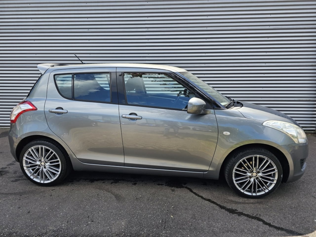Suzuki Swift - 1.2 Summer EASSS 1.2 Summer EASSS - AutoWereld.nl