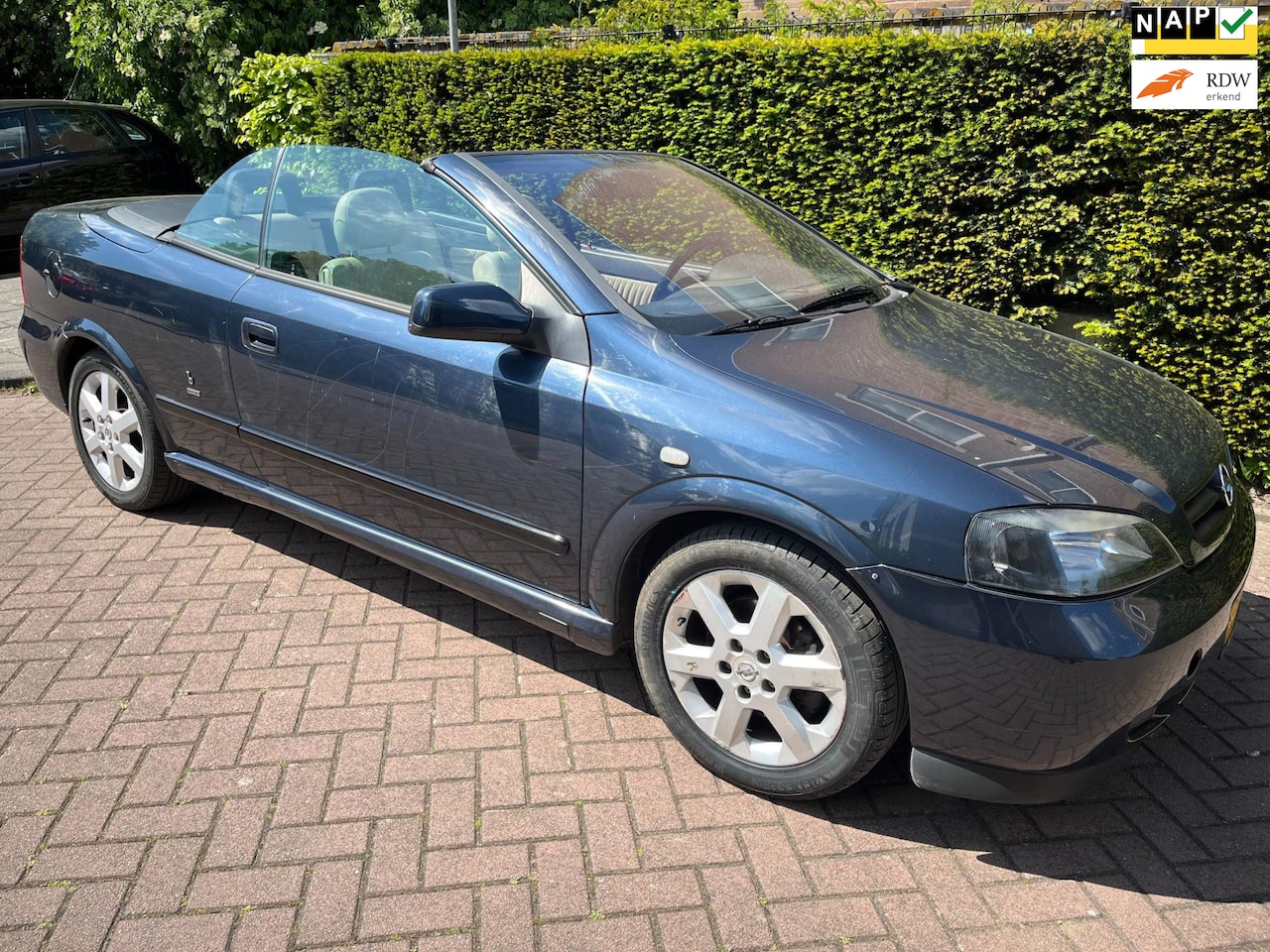 Opel Astra Cabriolet - 1.8-16V airco elektrisch dak leder - AutoWereld.nl