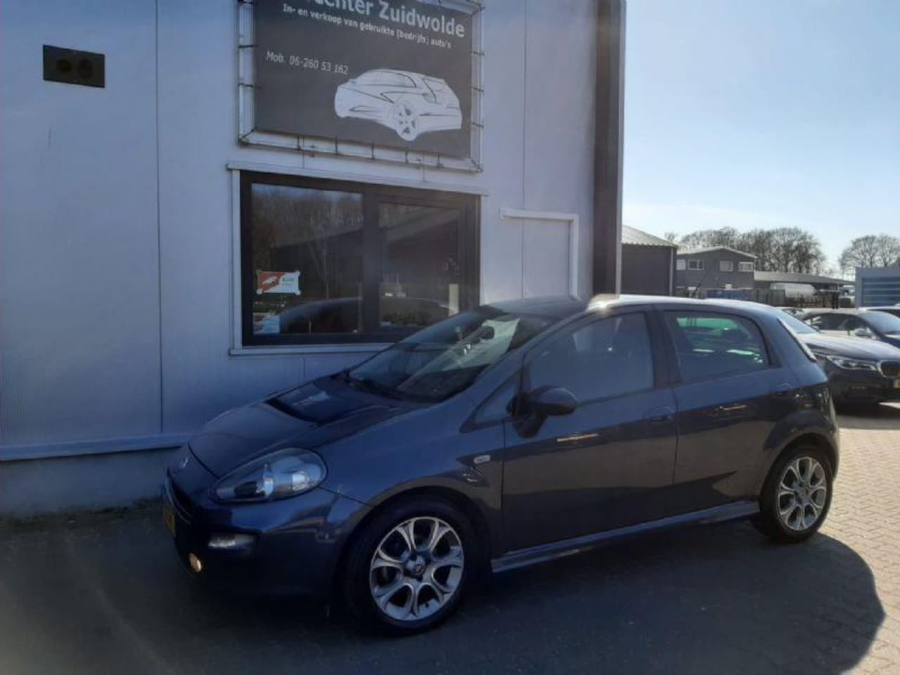 Fiat Punto Evo - 0.9 TwinAir Lounge clima cruise lmv apk 2-2026 - AutoWereld.nl