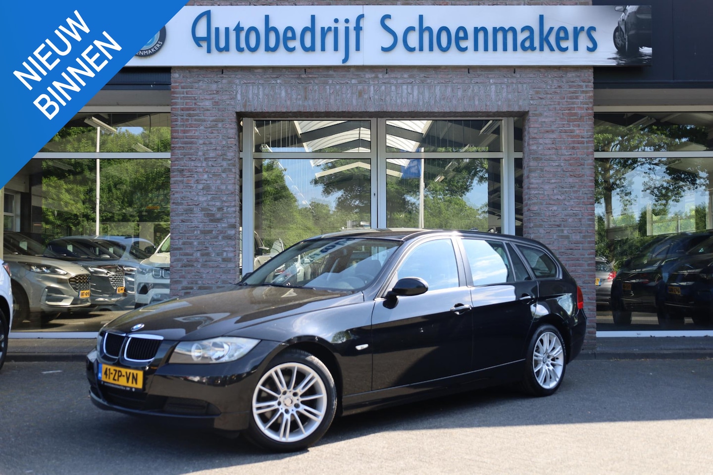 BMW 3-serie Touring - 318i Business Line LEER CRUISE STOELVERWARMING 17"LMV NAP PDC CLIMA - AutoWereld.nl