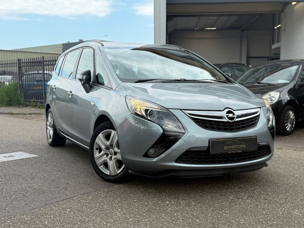 Opel Zafira Tourer - 1.4 Cosmo 7p.nap apk navi dealeronder vol optie - AutoWereld.nl
