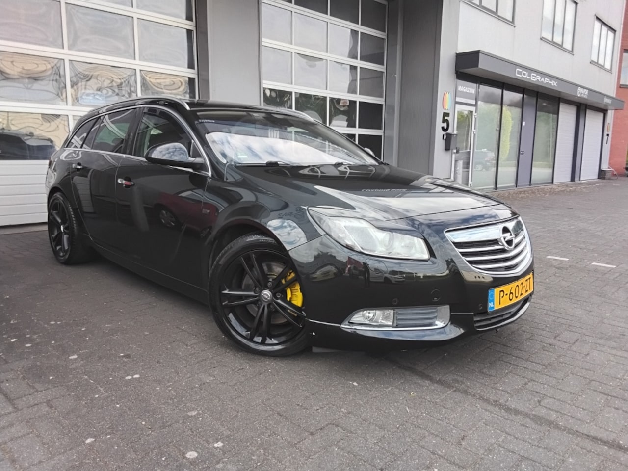 Opel Insignia Sports Tourer - 2.8 T Cosmo 4x4 2.8 T Cosmo 4x4 - AutoWereld.nl