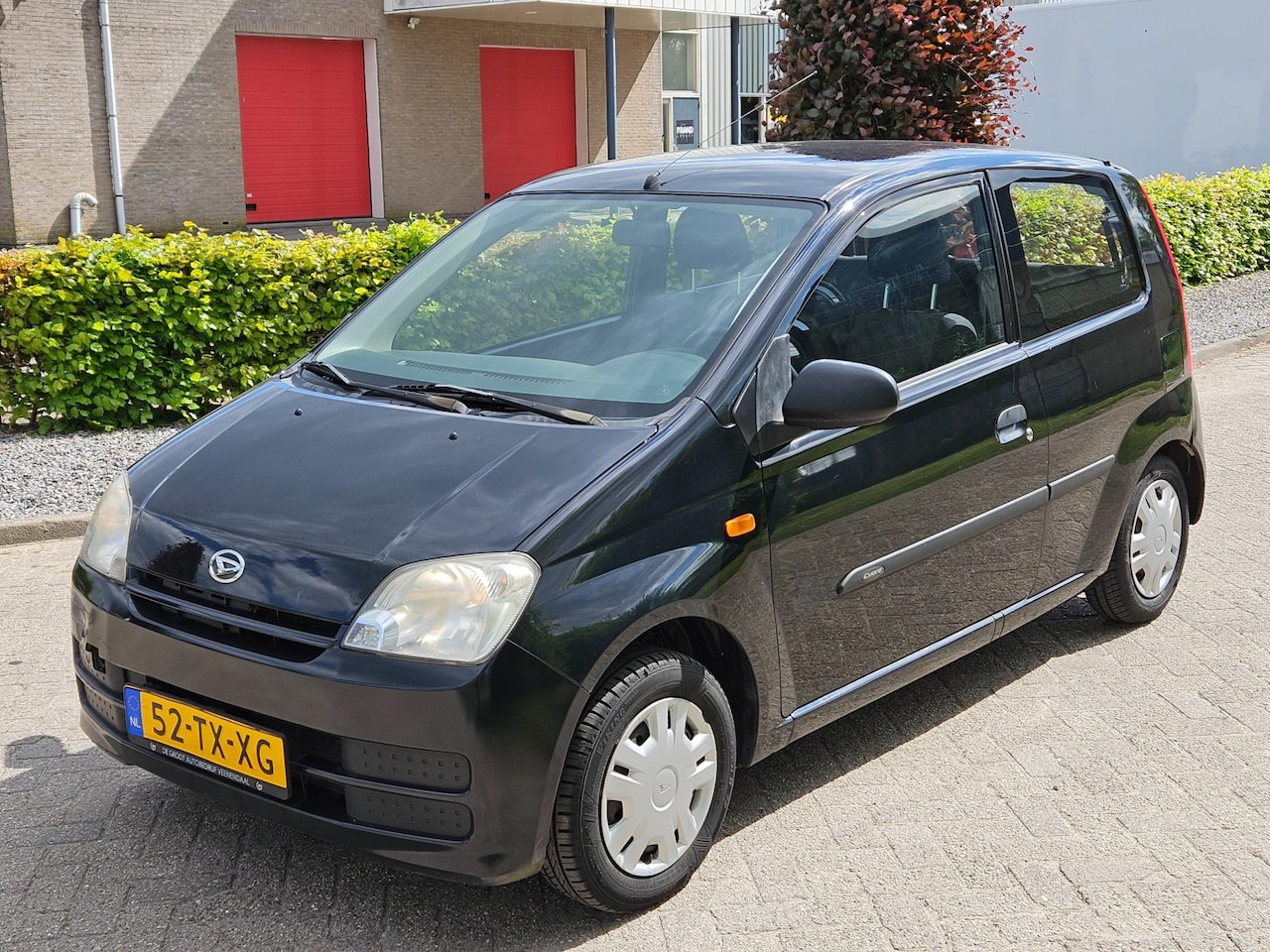 Daihatsu Cuore - 1.0-12V Tokyo Automaat. Heeft rijbare schade !! - AutoWereld.nl