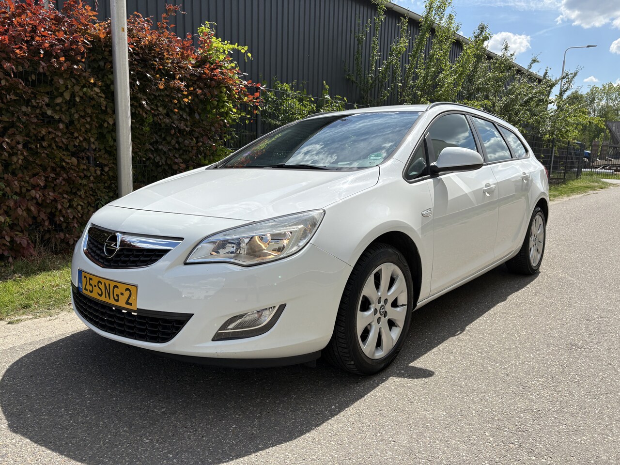 Opel Astra Sports Tourer - 1.4 Edition / AIRCO / CRUISE - AutoWereld.nl