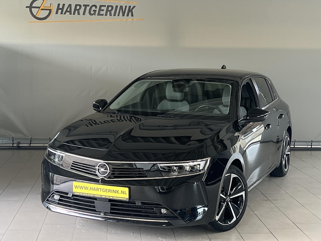 Opel Astra - 1.6 Hybrid 180pk Aut Business Elegance - AutoWereld.nl