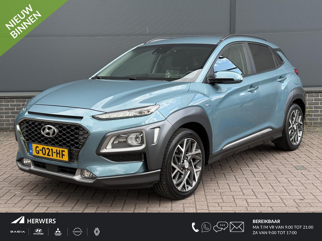Hyundai Kona - 1.6 GDI HEV Premium / Elektrische Stoelen / Blindspot / Head-Up Display / Stoel Verwarming - AutoWereld.nl