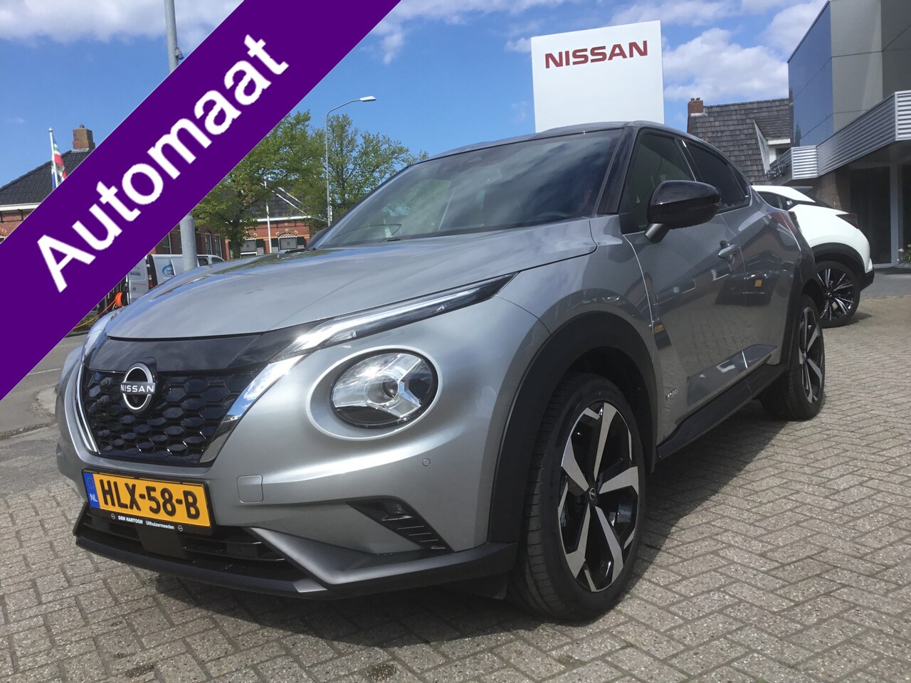 Nissan Juke - 1.6 HEV DCT Hybrid Tekna Bose Cold Pack - AutoWereld.nl